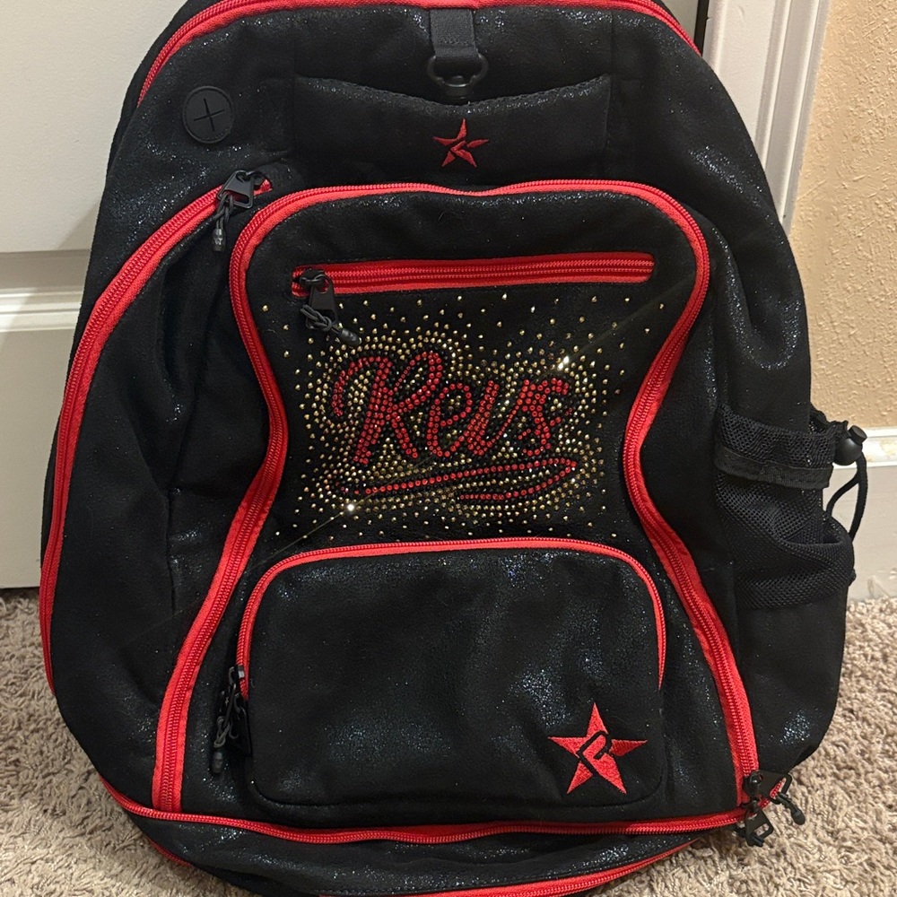 Top Gun Revelation Black and Red Backpack with Star Design